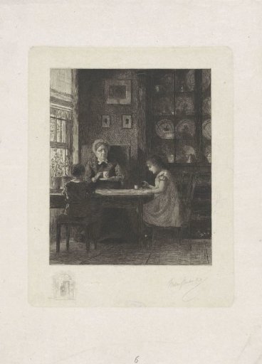 Mother with two children at the table