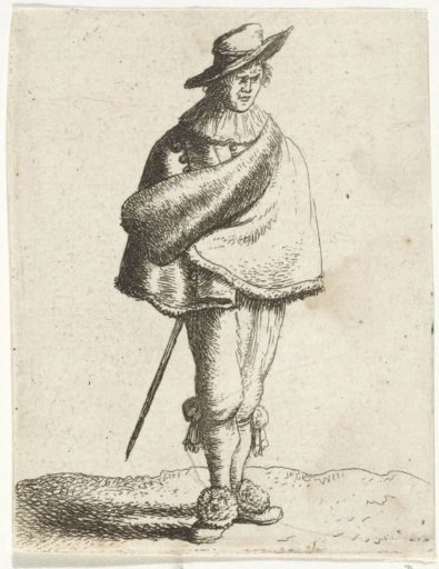 Young man with hat and cloak
