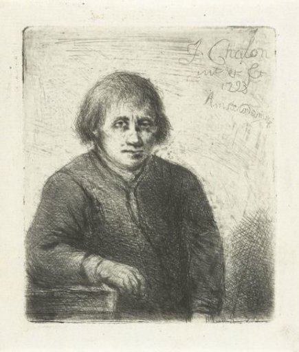 Young man leaning on a table