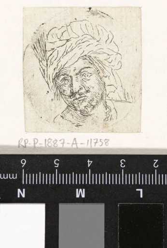 Man's head with a turban
