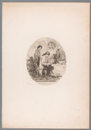 Connoisseur studying antique porcelain and earthenware