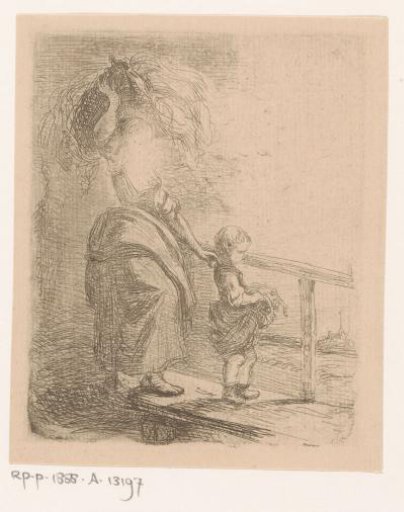 Woman carrying hay on her head and leading a child across a wooden bridge