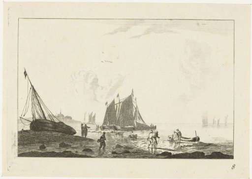 Beach with a sailing ship drawn up on the sand