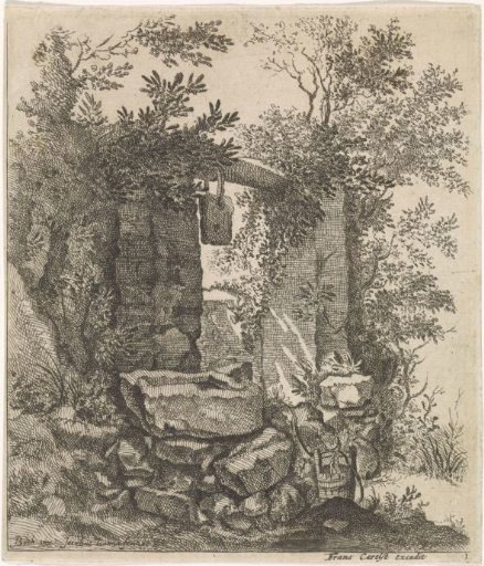 Ruined stone gate in a landscape