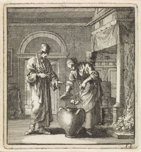A woman putting a glowing coal into the snuffer pot