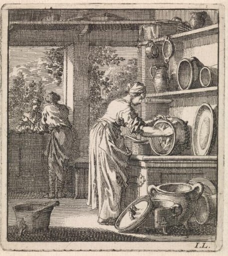 A woman cleaning a cooking pot
