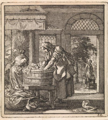Woman washing linen in a wash tub