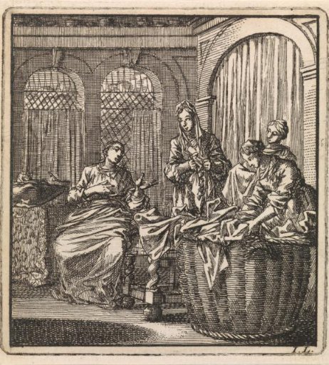 Four women by a laundry basket