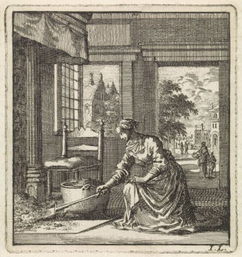 Woman shovelling the ashes from the fireplace