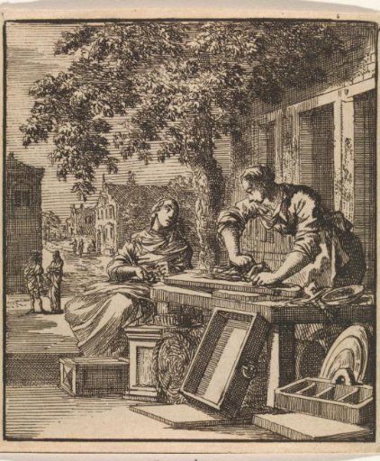 A man sanding wood in front of a house facade
