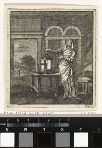 Woman placing a lit lantern on a table