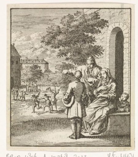 Father pointing out playing children to his son