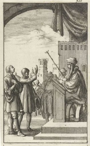 A man taking an oath before a judge