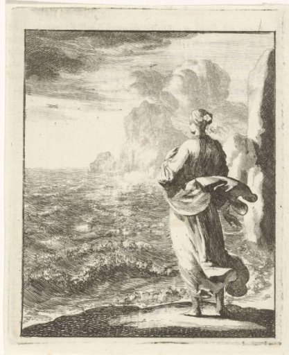 Woman looking out to sea from the shore