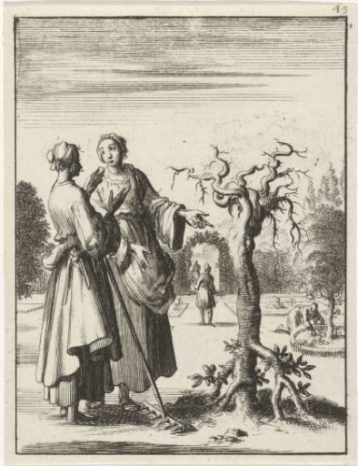 Two women looking at a tree planted with its roots upwards