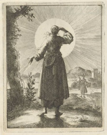 Woman holding her hand before her eyes while looking at the sun