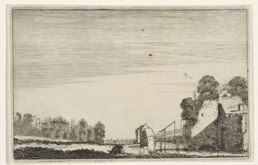 House ruin with a wooden bridge in a landscape