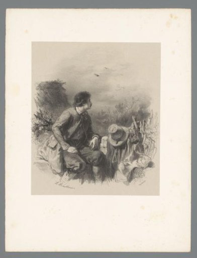 Man in a field looking out over the landscape