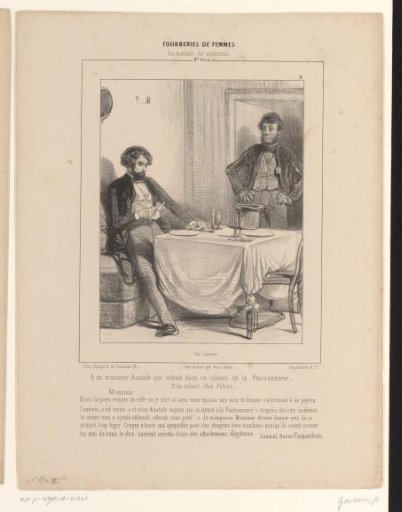 Young man reading a letter in a restaurant