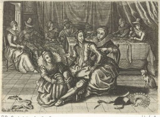 Two women undressing a man
