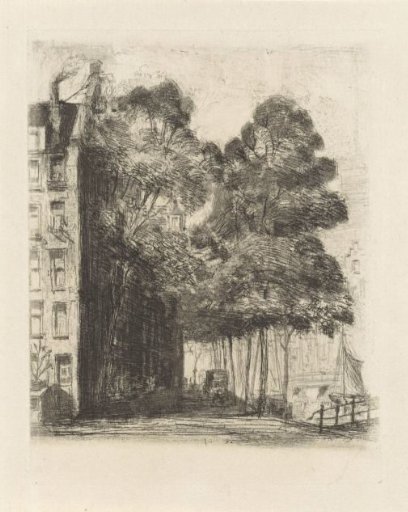 View of a corner house on a canal in Amsterdam