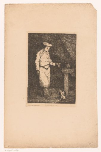 Dark interior with a cook holding up a piece of meat for a cat