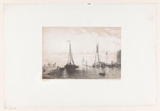 Boats on the beach and in the harbour