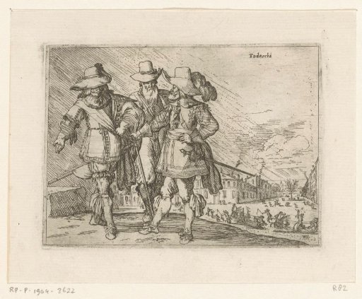 Three Germans, sleds in the background
