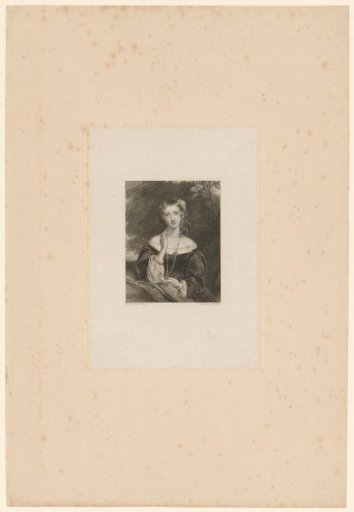 Young woman with a medallion around her neck