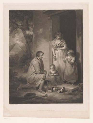 Man shows guinea pigs to a young woman and two girls