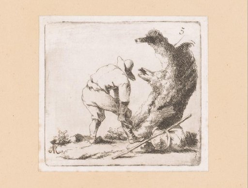 Traveler putting on his shoe by a tree