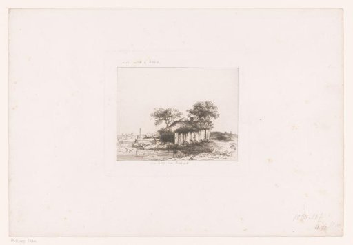 Farmhouse with white fence