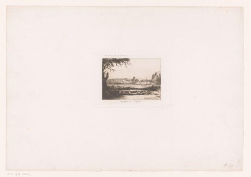 Canal with rowboat and bridge