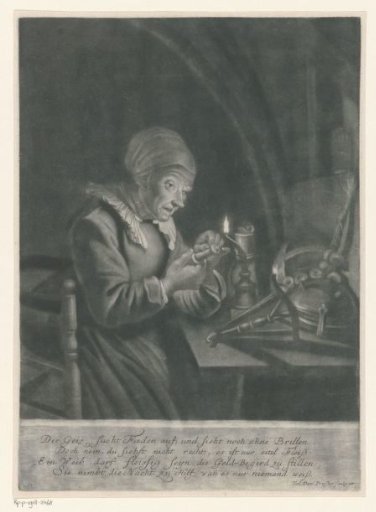 Maid working by candlelight