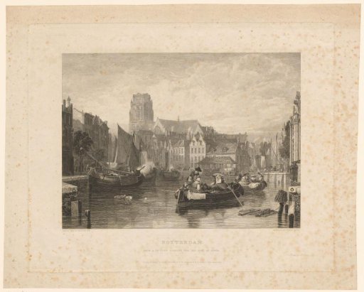 View of a canal in Rotterdam with the Laurens Church