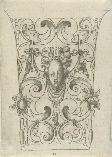 Cup with a mascaron