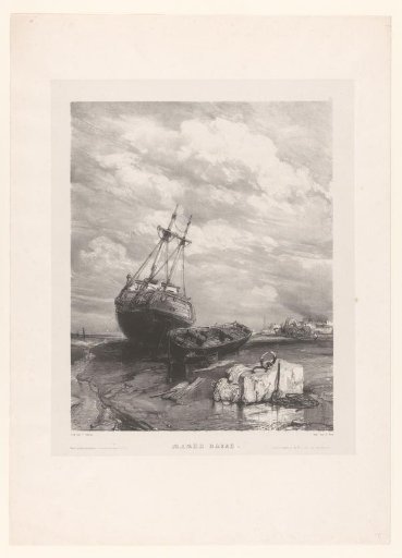 Two boats on the beach at low tide
