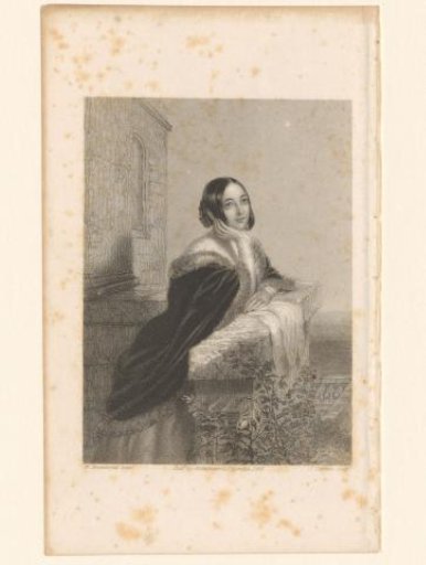 Young woman leaning on a wall