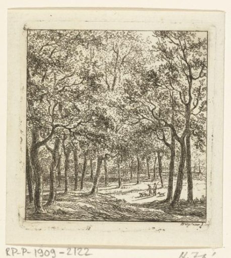 Two men with dogs in the forest