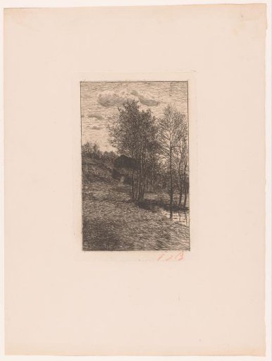 A small building on a hillside in a wooded area