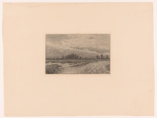 Country road with a church tower in the background