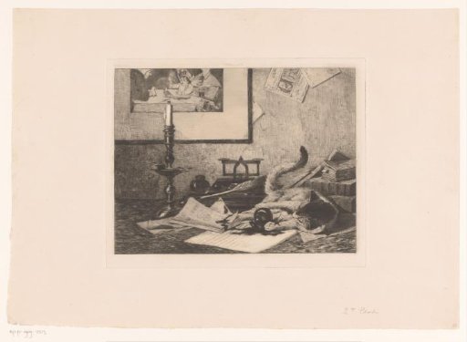 A playing cat knocks an inkpot over the table
