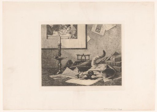 A playing cat knocks an inkpot over on the table