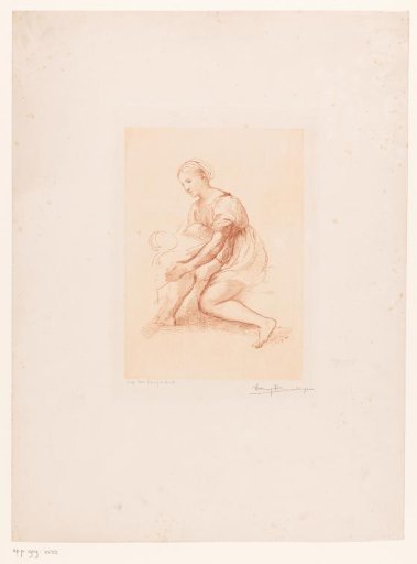 Seated young woman holding her child