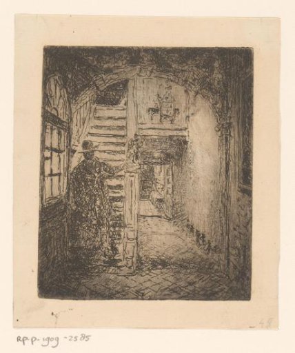 Man on the stairs of the Brouwershuis in Antwerp