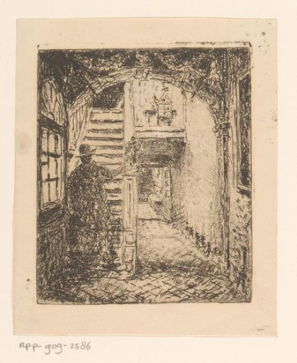 Man on the stairs of the Brouwershuis in Antwerp