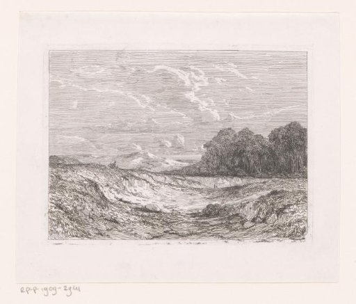 Bare landscape with hills and woodland in the background
