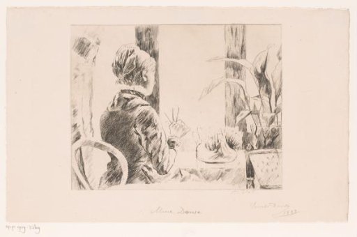 Woman knitting at the window
