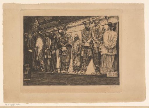 Row of clothed skeletons against a wall