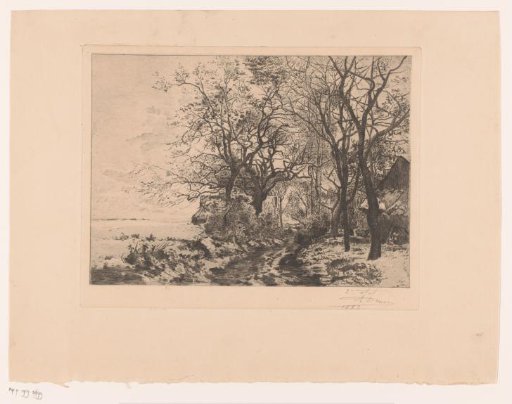 Snow landscape with a barn at the edge of the woods